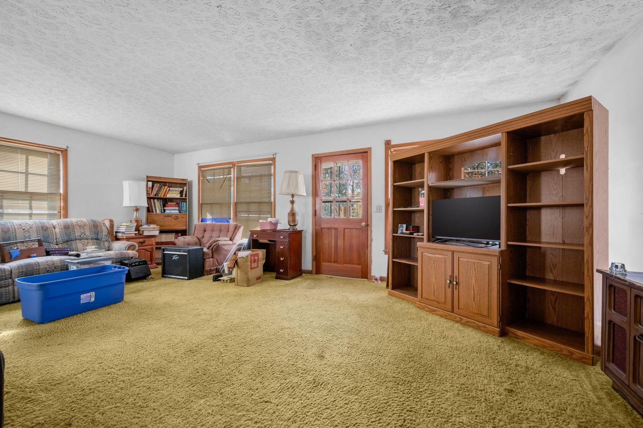 1032 Old State Rte 50 Centerville, TN 37033 - Photo 27 of 33 a living room with furniture and a flat screen tv