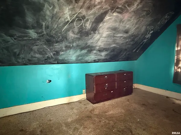 wooden floor and window in an empty room