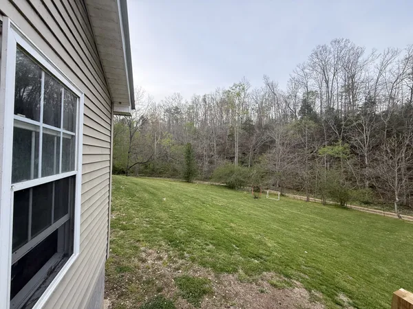 a view of outdoor space and yard
