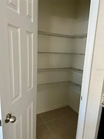 a empty closet with white paint