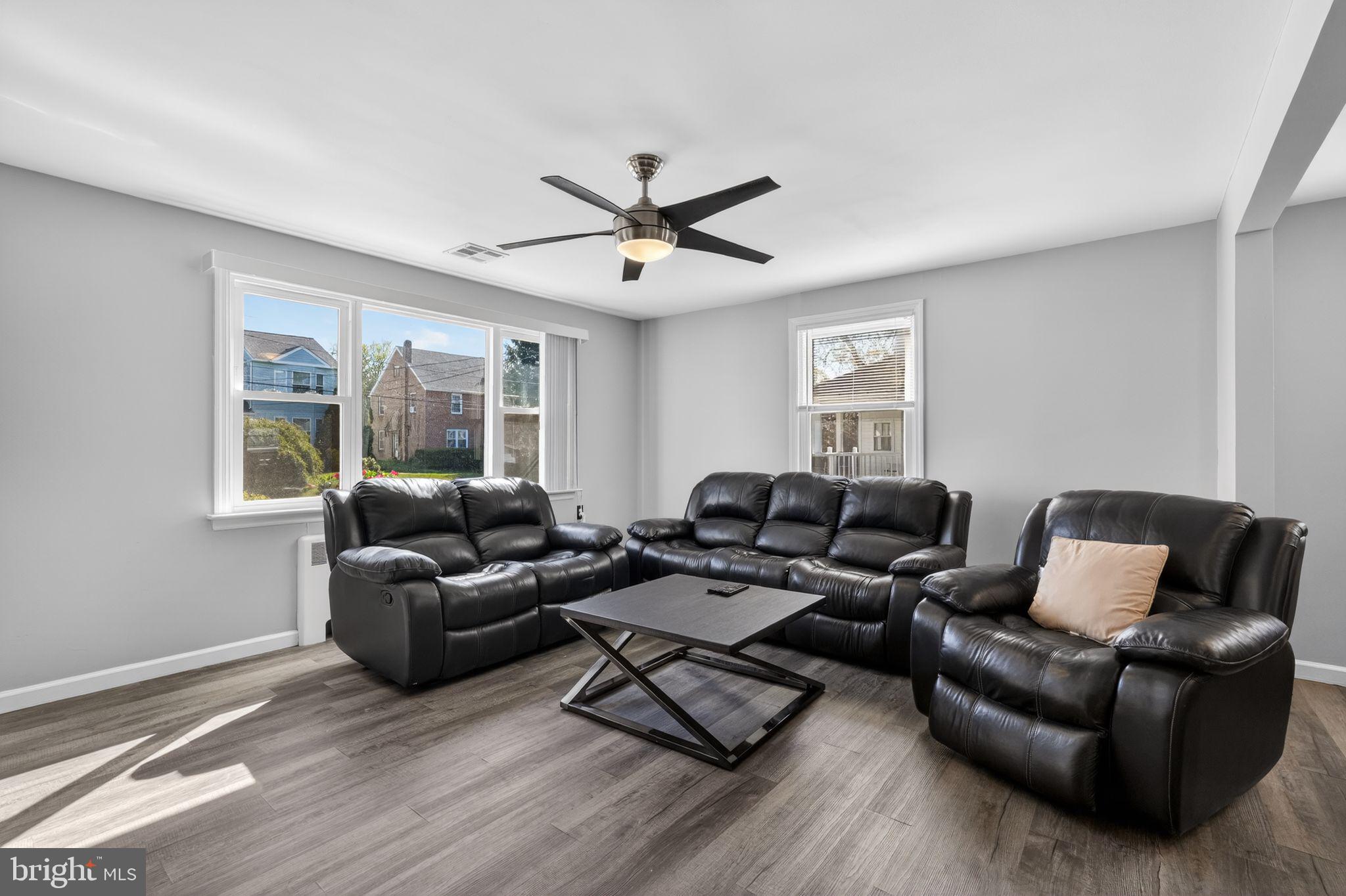 110 McCormick Avenue Ridley Park, PA 19078 - Photo 3 of 29 a living room with furniture and a large window