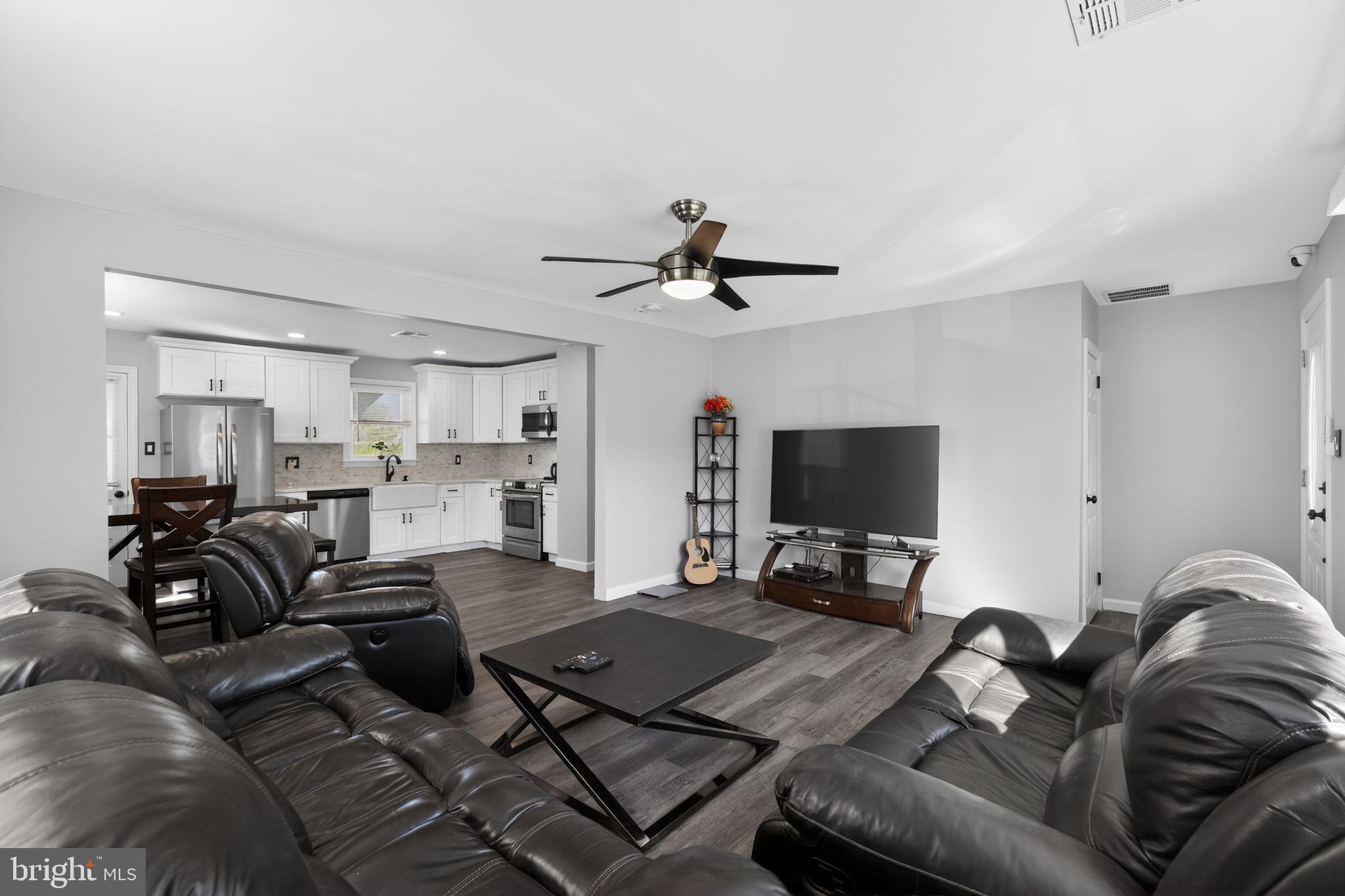 110 McCormick Avenue Ridley Park, PA 19078 - Photo 4 of 29 a living room with furniture and a flat screen tv