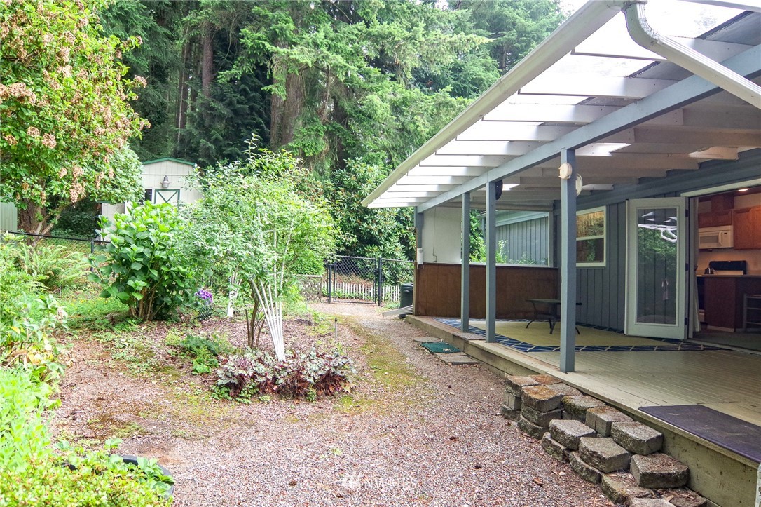 3309 206th Place Southeast Bothell, WA 98012 - Photo 16 of 32 a backyard of a house with lots of green space
