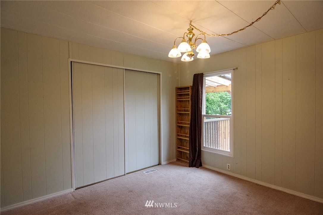 3309 206th Place Southeast Bothell, WA 98012 - Photo 20 of 32 an empty room with windows and closet