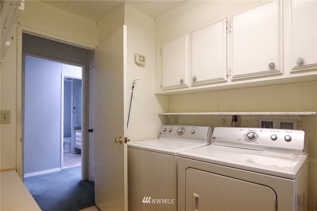 3309 206th Place Southeast Bothell, WA 98012 - Photo 21 of 32 a utility room with dryer and washer