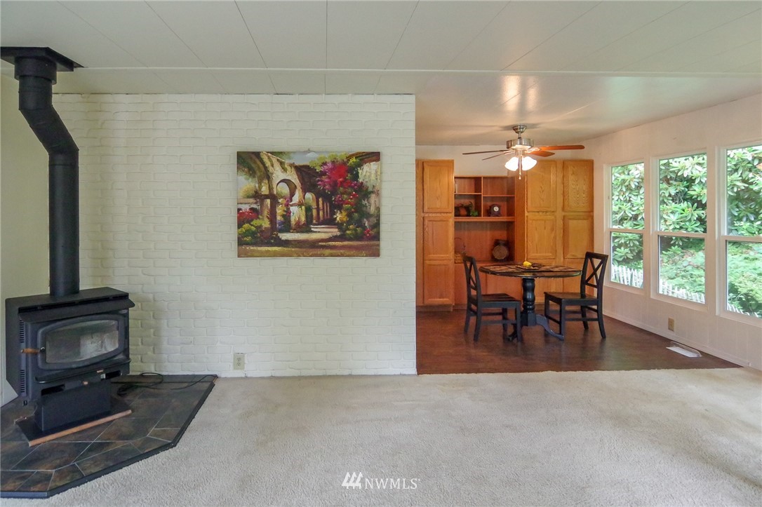 3309 206th Place Southeast Bothell, WA 98012 - Photo 6 of 32 a view of a livingroom with furniture window and outside view