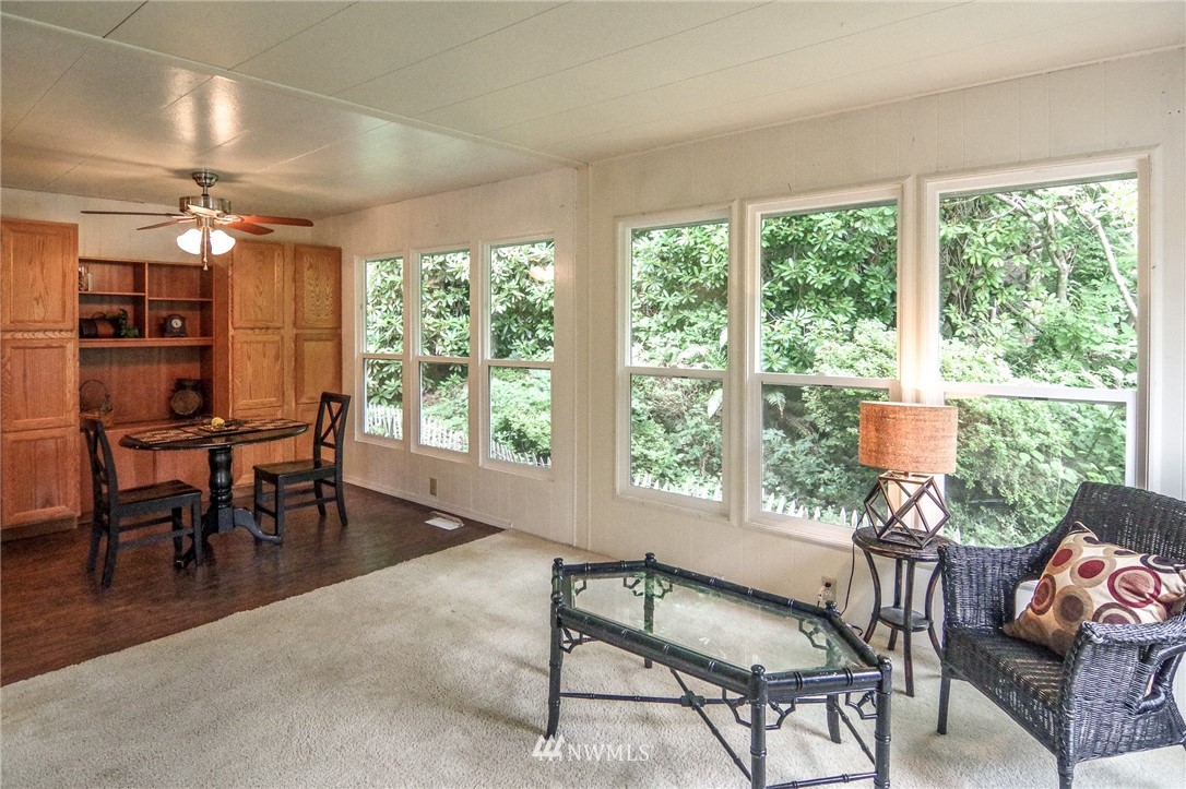 3309 206th Place Southeast Bothell, WA 98012 - Photo 7 of 32 a view of a dining room with furniture window and outside view