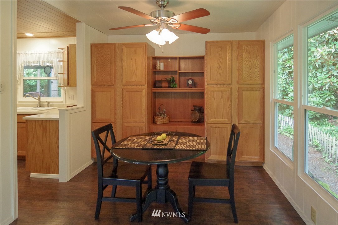 3309 206th Place Southeast Bothell, WA 98012 - Photo 10 of 32 a view of a dining room with furniture window and outside view