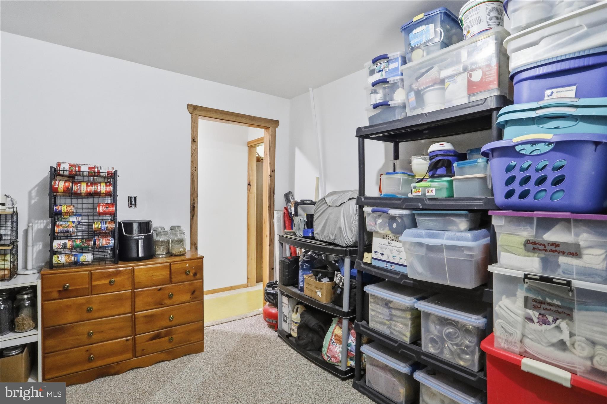936 Johnny Cake Road Great Cacapon, WV 25422 - Photo 26 of 33 a room with storage and utility
