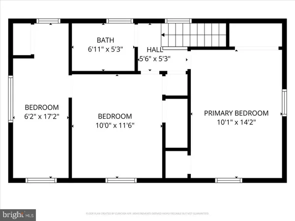 a picture of a bench in the wall