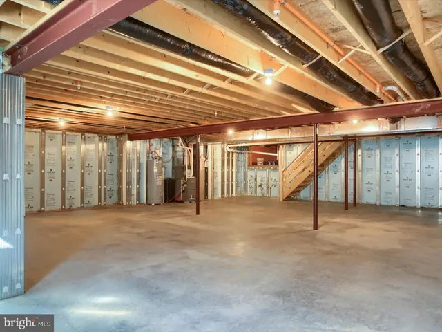 a view of a livingroom with furniture and windows