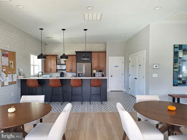 a living room with furniture fireplace and a flat screen tv