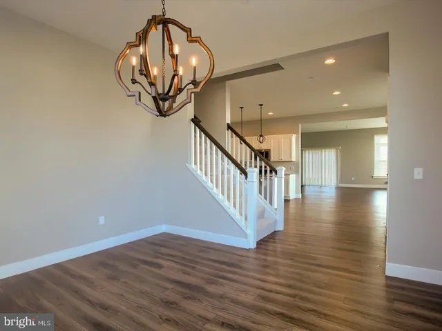 a view of a livingroom with wooden floor