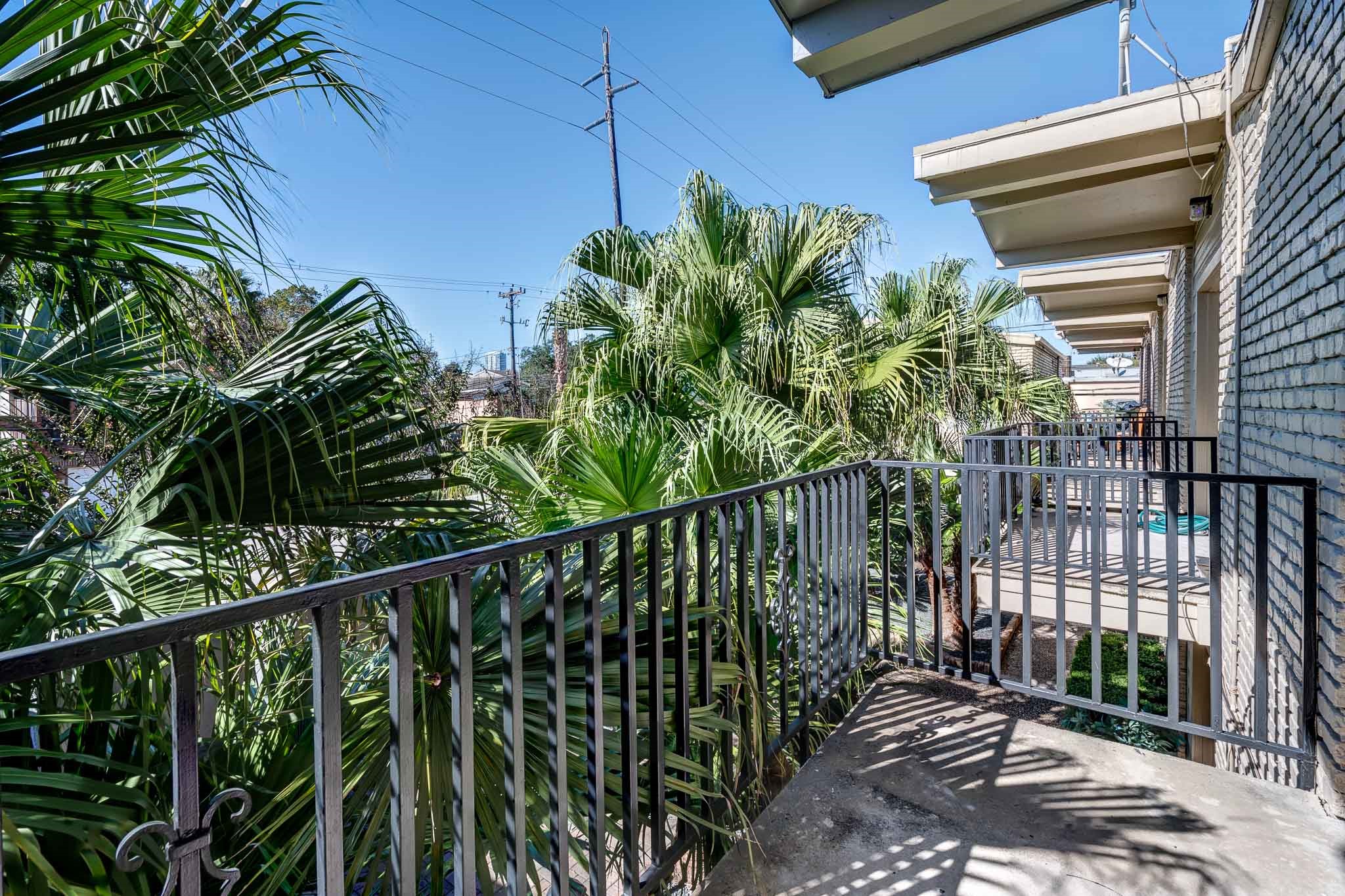 4321 Hazard Street, Unit 9 Houston, TX 77098 - Photo 6 of 8 a view of a balcony with a plant