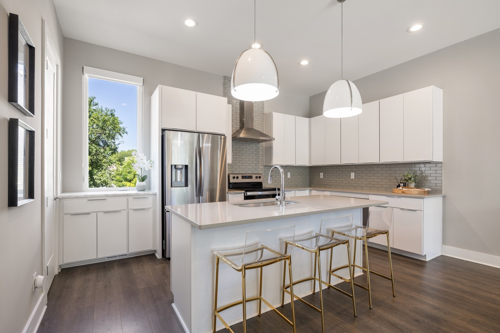 1300 Lischey Avenue, Unit 2 Nashville, TN 37207 - Photo 14 of 55 a kitchen with stainless steel appliances granite countertop a sink a stove a refrigerator and island with wooden floor