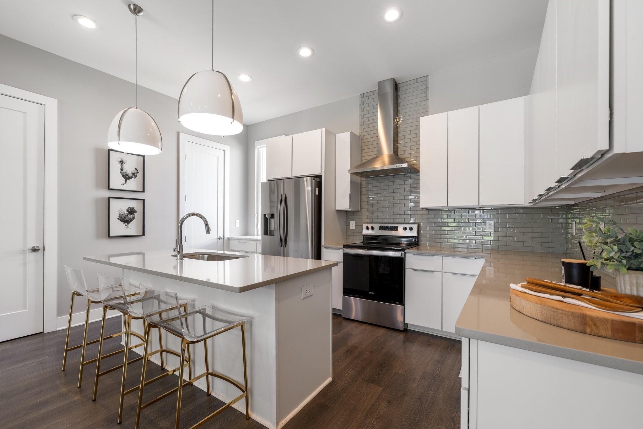 1300 Lischey Avenue, Unit 2 Nashville, TN 37207 - Photo 15 of 55 a kitchen with stainless steel appliances granite countertop a sink a stove a refrigerator cabinets and chairs