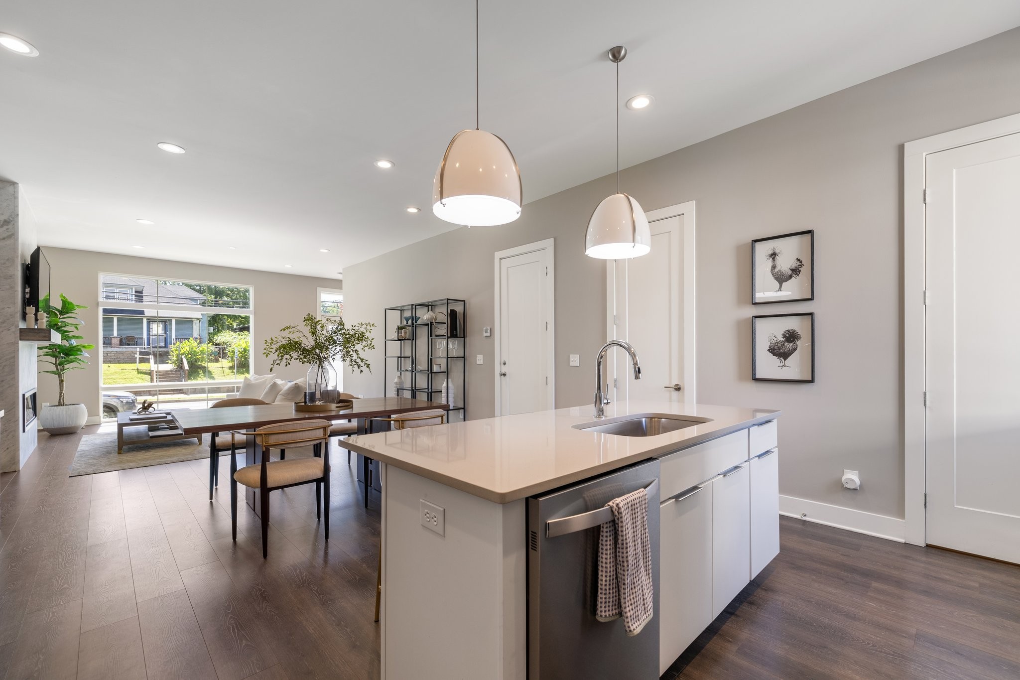1300 Lischey Avenue, Unit 2 Nashville, TN 37207 - Photo 17 of 55 a kitchen with a stove center island wooden floor and a view of living room