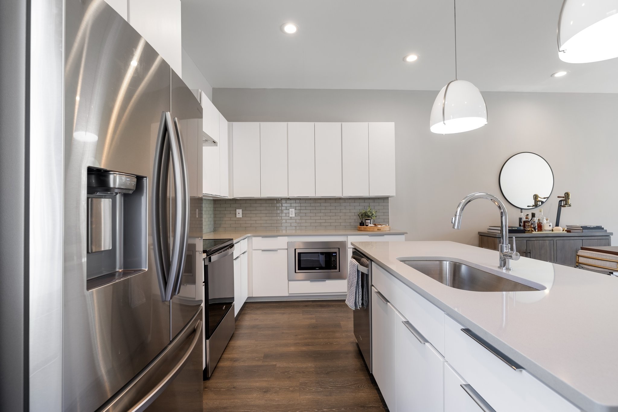 1300 Lischey Avenue, Unit 2 Nashville, TN 37207 - Photo 18 of 55 a kitchen with stainless steel appliances granite countertop a sink and a refrigerator
