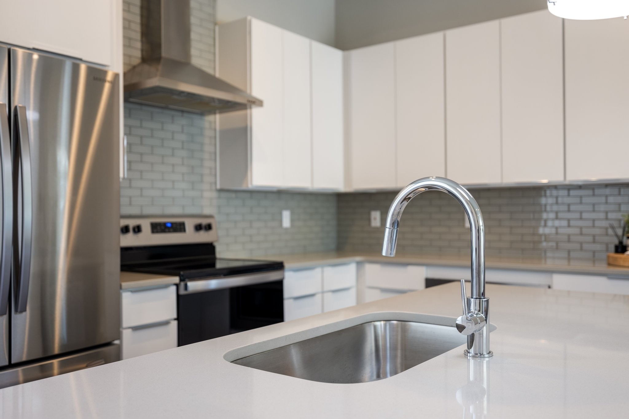 1300 Lischey Avenue, Unit 2 Nashville, TN 37207 - Photo 19 of 55 a kitchen with a sink cabinets and stainless steel appliances