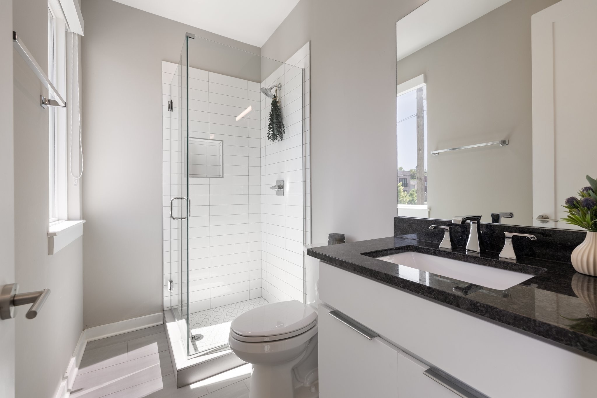 1300 Lischey Avenue, Unit 2 Nashville, TN 37207 - Photo 33 of 55 a bathroom with a granite countertop sink toilet and shower