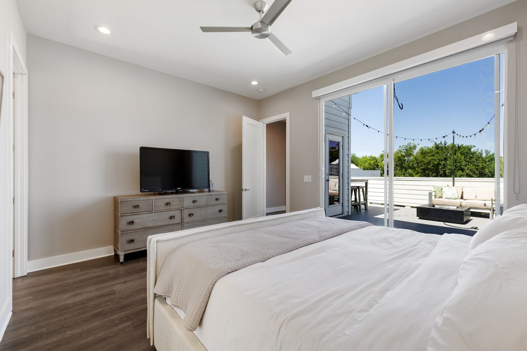 1300 Lischey Avenue, Unit 2 Nashville, TN 37207 - Photo 41 of 55 a bedroom with a bed and a flat screen tv