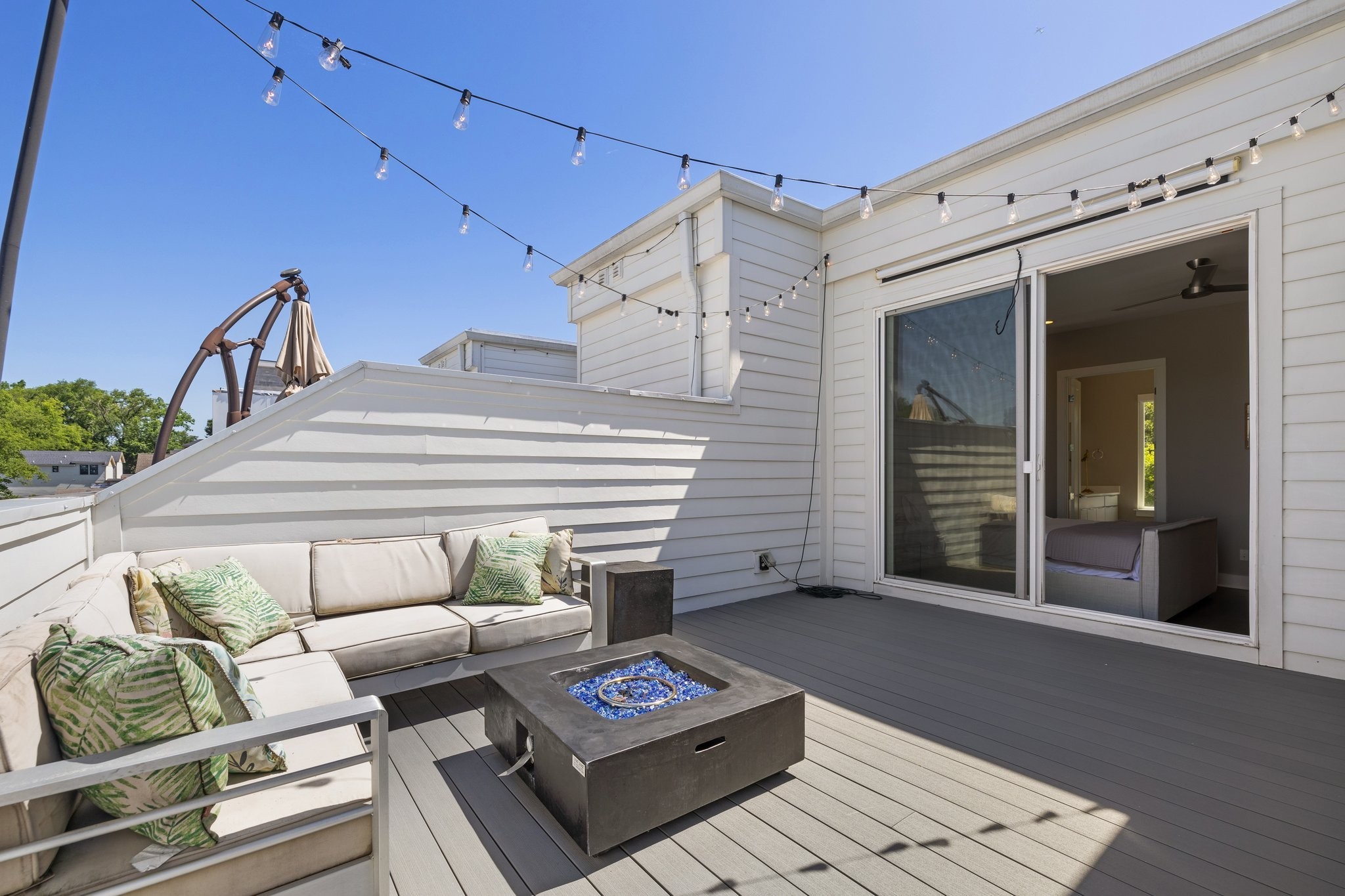 1300 Lischey Avenue, Unit 2 Nashville, TN 37207 - Photo 48 of 55 a view of a patio with couches and a potted plant on a table