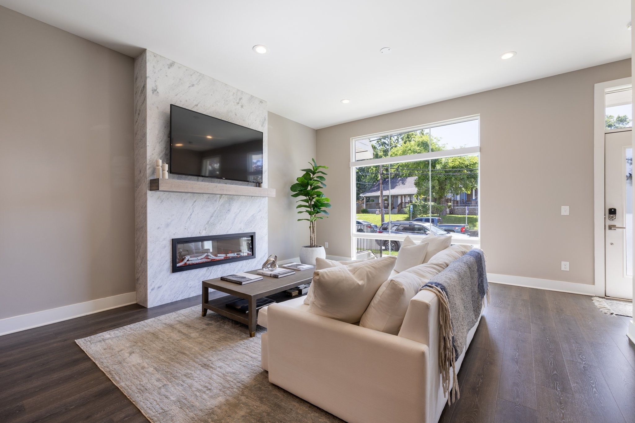 1300 Lischey Avenue, Unit 2 Nashville, TN 37207 - Photo 7 of 55 a living room with furniture and a flat screen tv