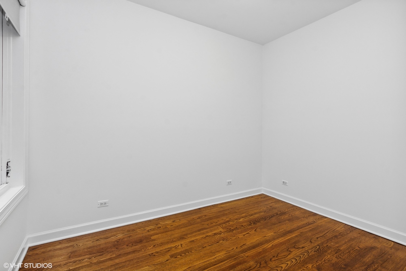 2130 West Rice Street, Unit 3 Chicago, IL 60622 - Photo 15 of 18 a view of empty room with wooden floor
