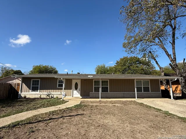 front view of a house with a patio
