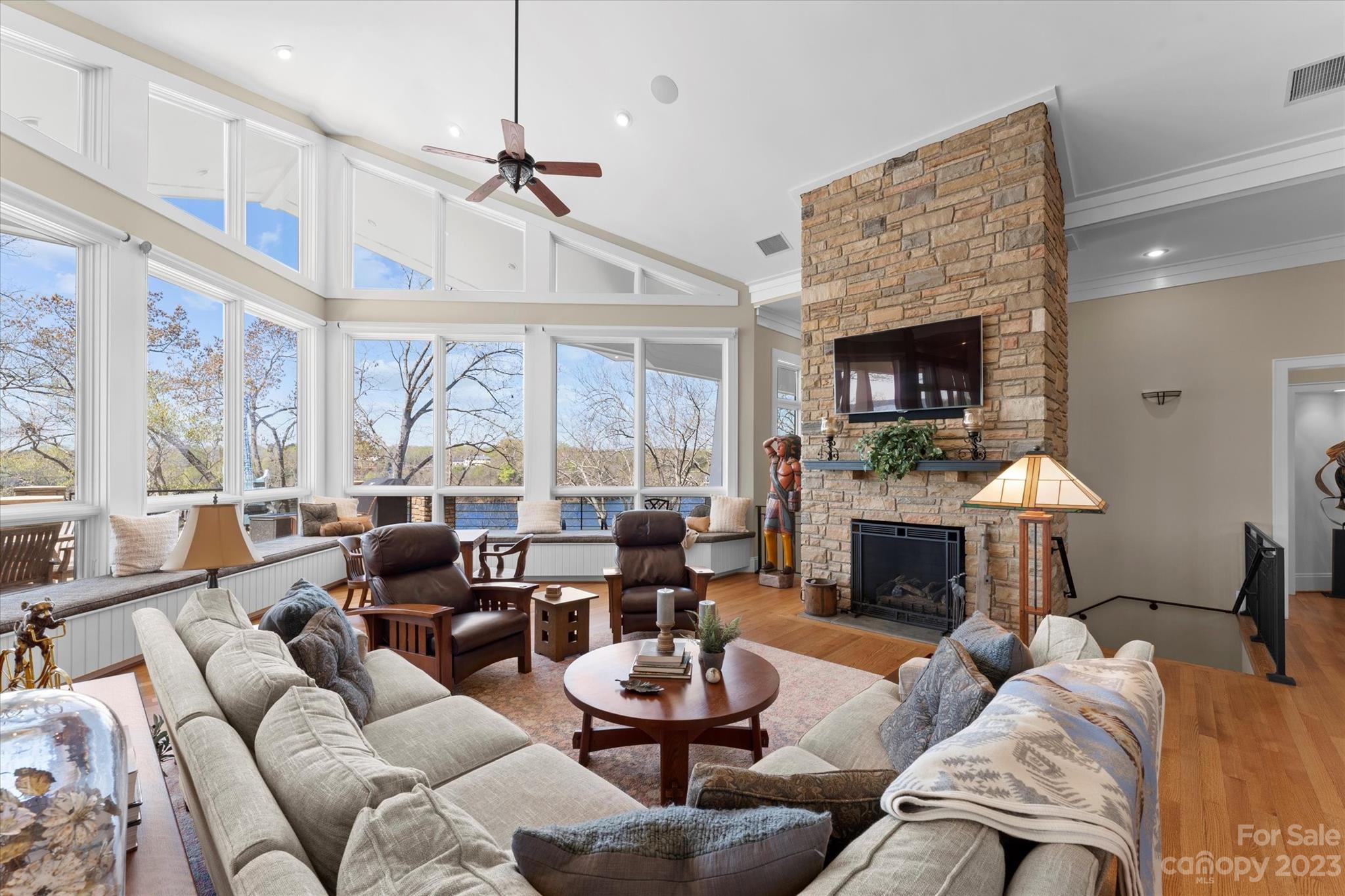 101 Island Ridge Drive Statesville, NC 28677 - Photo 11 of 48 a living room with furniture fireplace and a large window