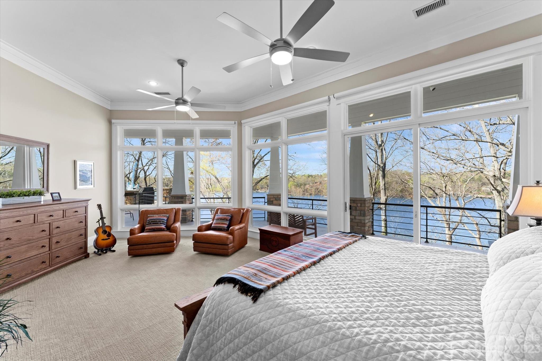 101 Island Ridge Drive Statesville, NC 28677 - Photo 17 of 48 a bedroom with furniture and large windows