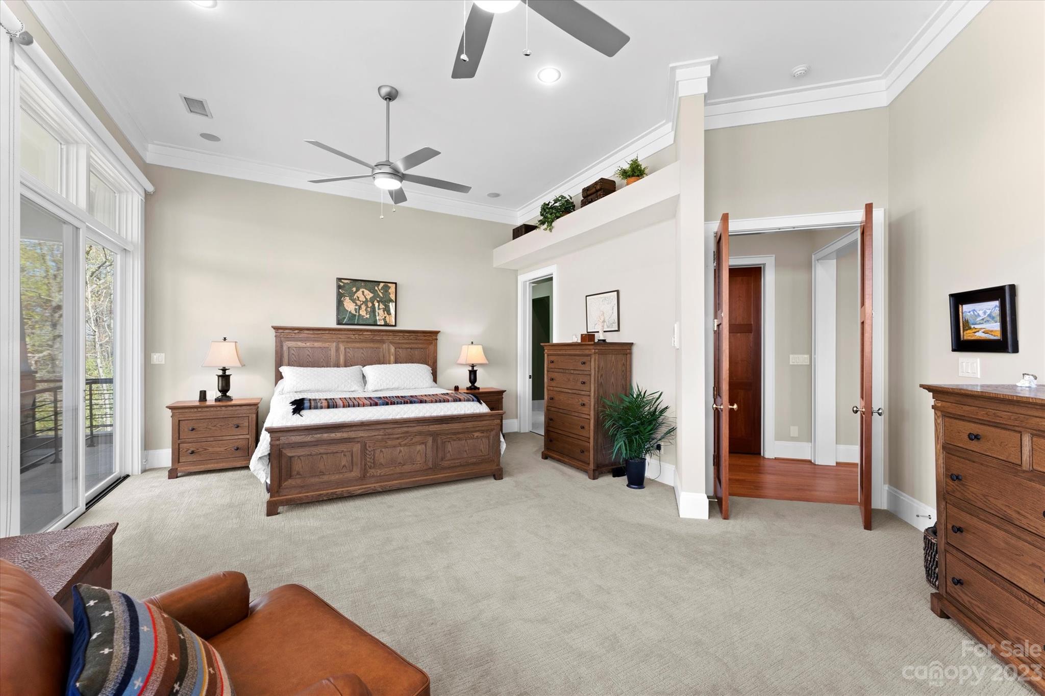 101 Island Ridge Drive Statesville, NC 28677 - Photo 18 of 48 a spacious bedroom with a bed and ceiling fan