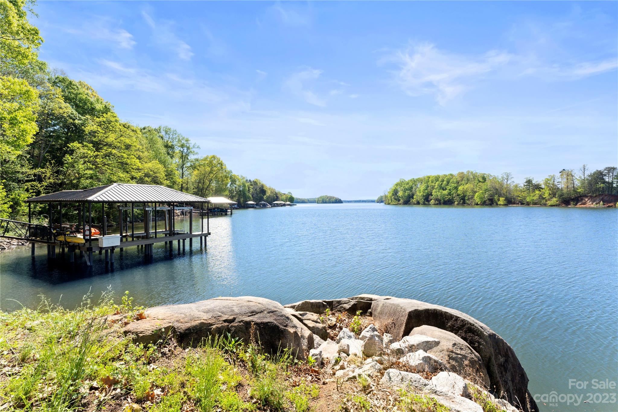 101 Island Ridge Drive Statesville, NC 28677 - Photo 47 of 48 a blue swimming pool with a lake view