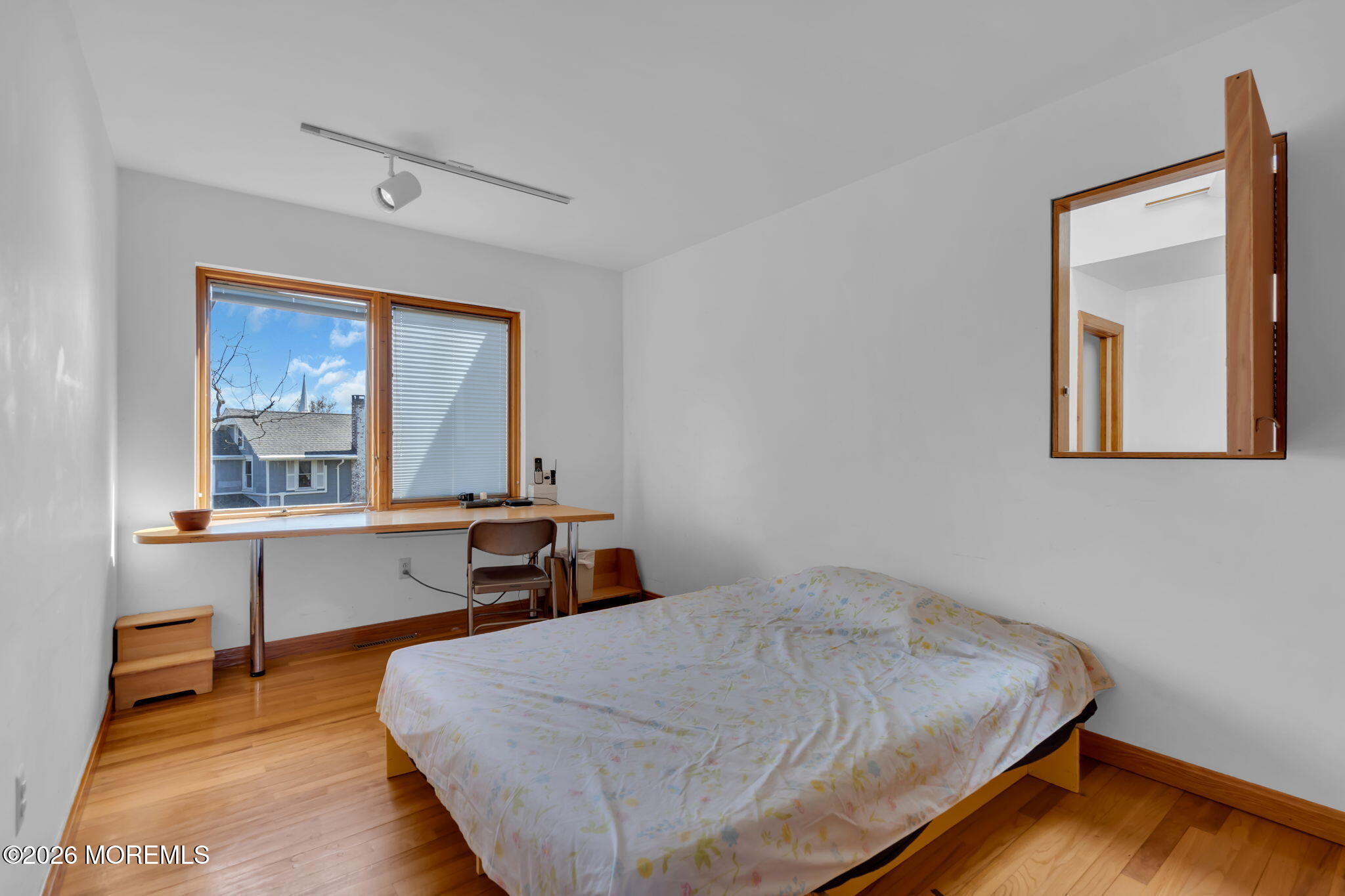 608 Rankin Road Brielle, NJ 08730 - Photo 18 of 27 a bedroom with a bed and a large window