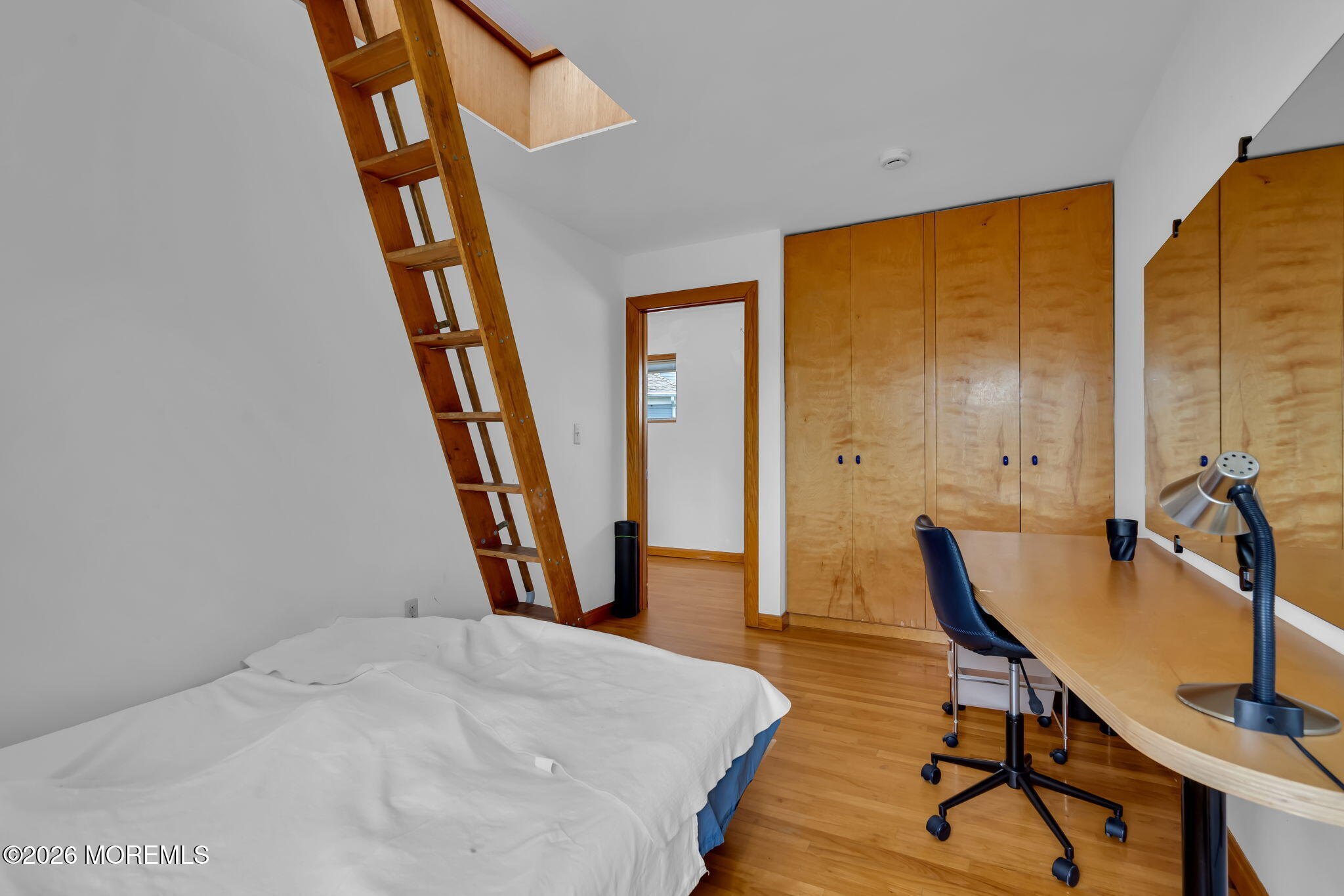 608 Rankin Road Brielle, NJ 08730 - Photo 19 of 27 a view of a hallway with furniture and staircase
