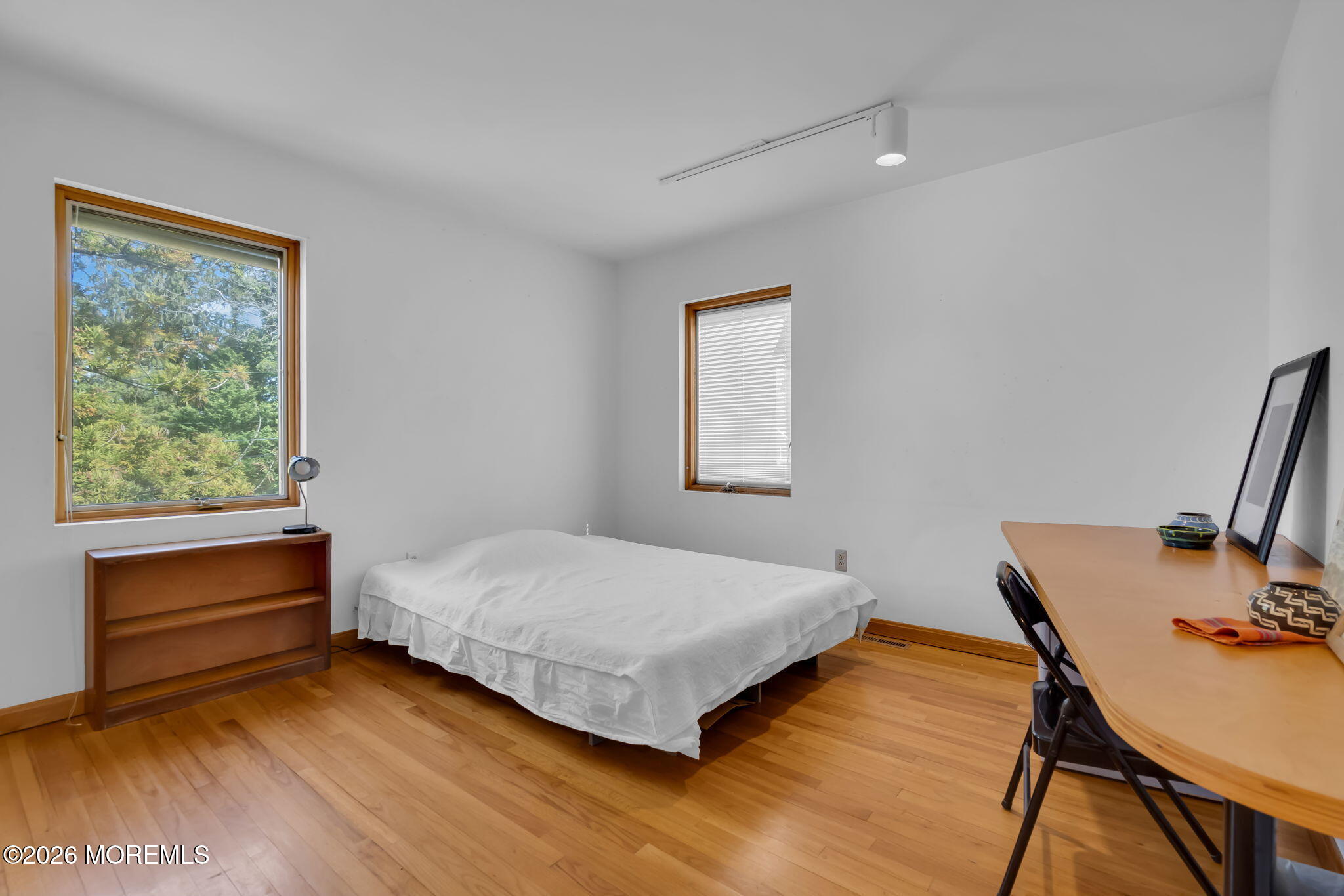 608 Rankin Road Brielle, NJ 08730 - Photo 20 of 27 a bedroom with a bed and a desk