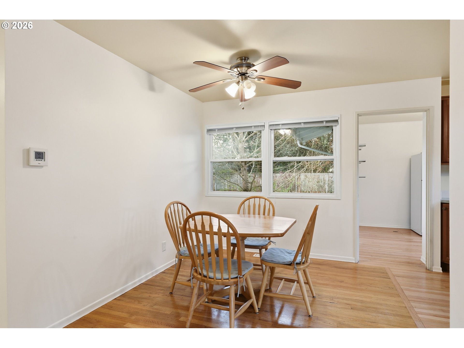 2710 Northwest Garfield Avenue Corvallis, OR 97330 - Photo 11 of 48 a view of a dining room with furniture window and wooden floor