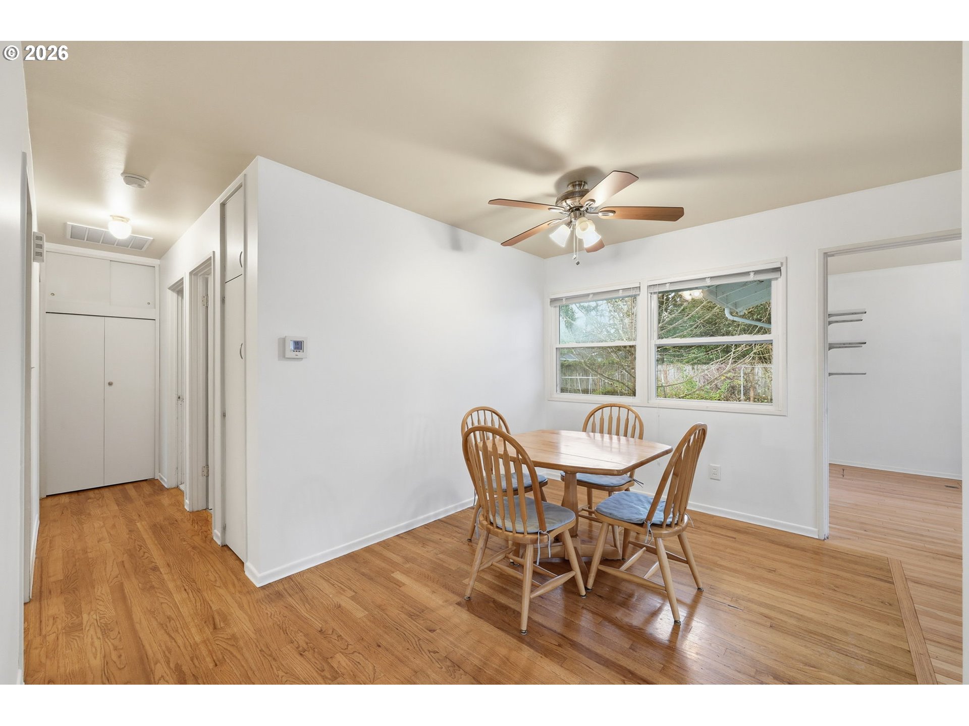 2710 Northwest Garfield Avenue Corvallis, OR 97330 - Photo 13 of 48 a view of a dining room with furniture and a window