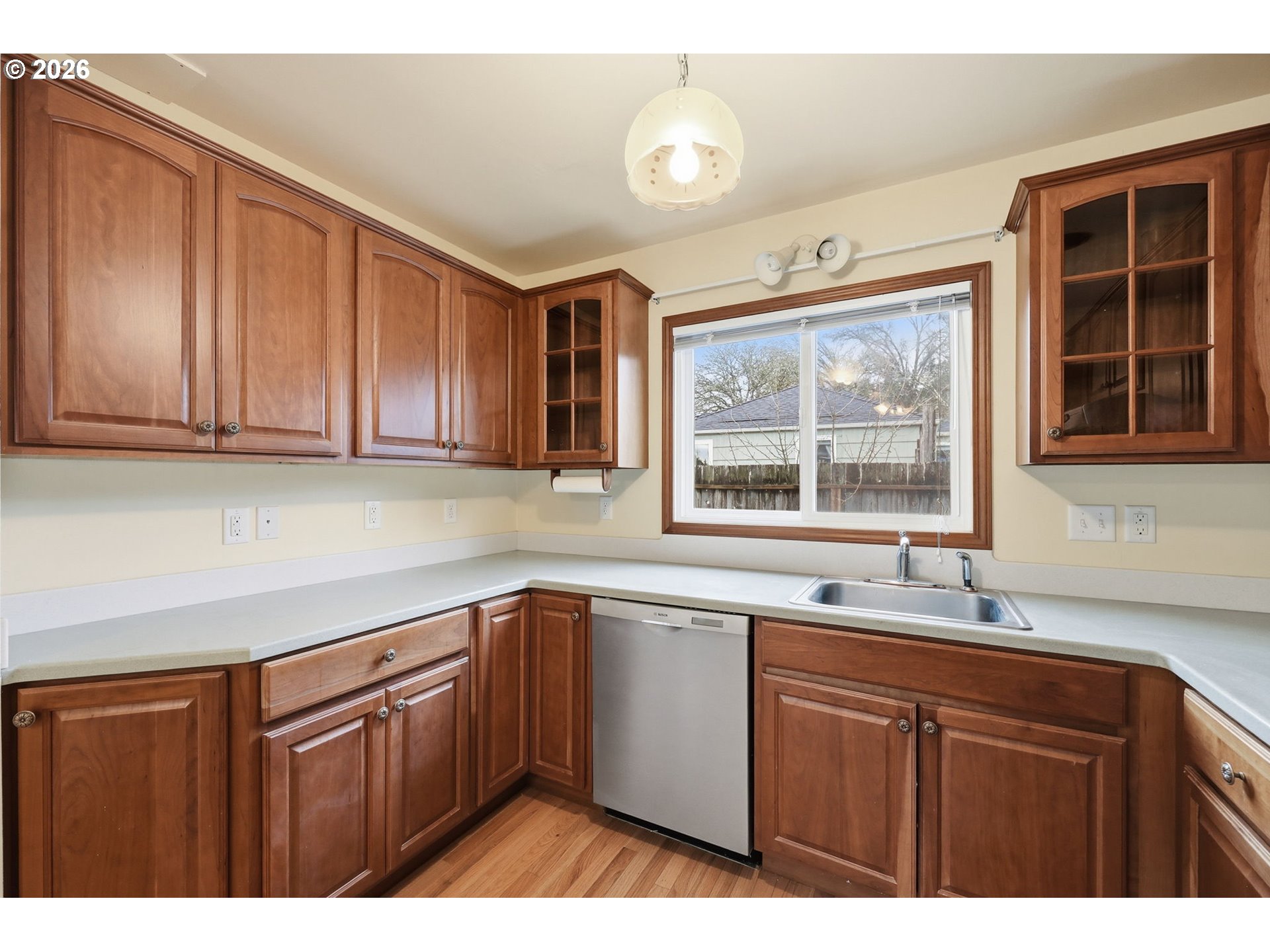 2710 Northwest Garfield Avenue Corvallis, OR 97330 - Photo 15 of 48 a kitchen with a sink window and cabinets