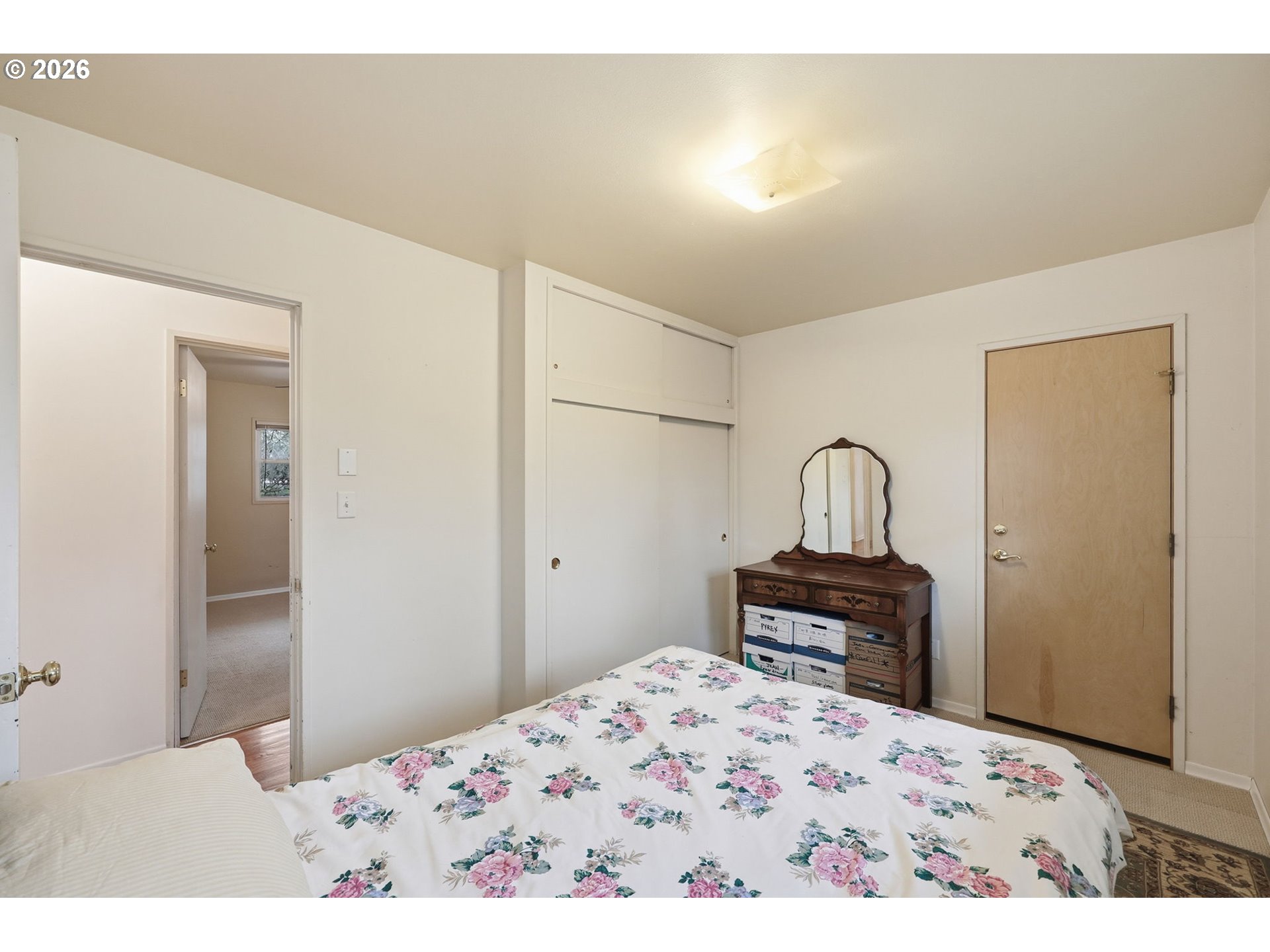 2710 Northwest Garfield Avenue Corvallis, OR 97330 - Photo 30 of 48 a bedroom with a bed and a dresser