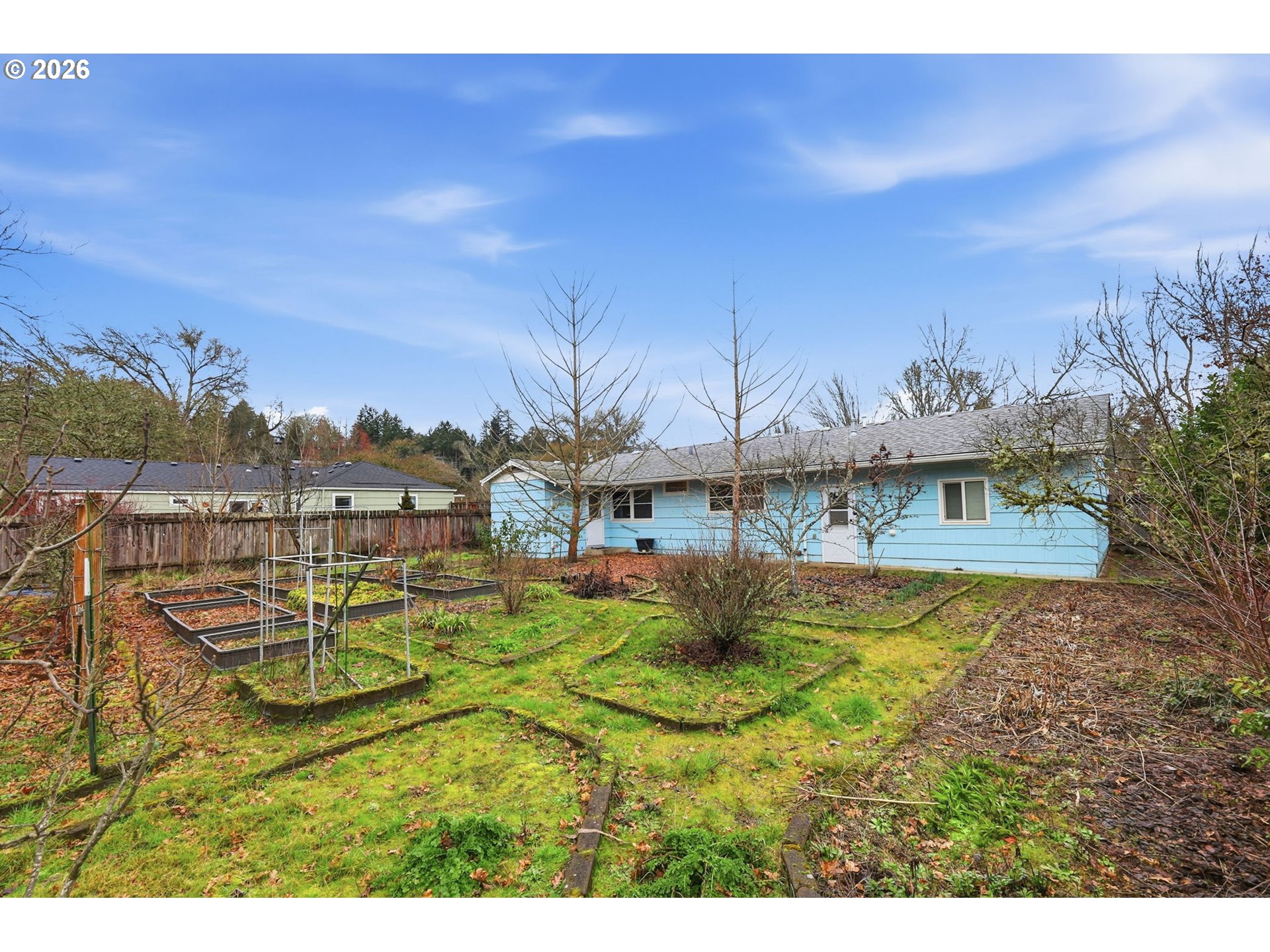 2710 Northwest Garfield Avenue Corvallis, OR 97330 - Photo 40 of 48 a view of a swimming pool with a table and chairs