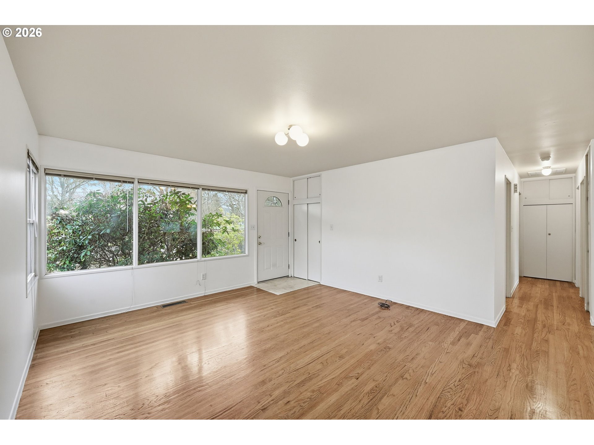 2710 Northwest Garfield Avenue Corvallis, OR 97330 - Photo 7 of 48 a view of an empty room with a window