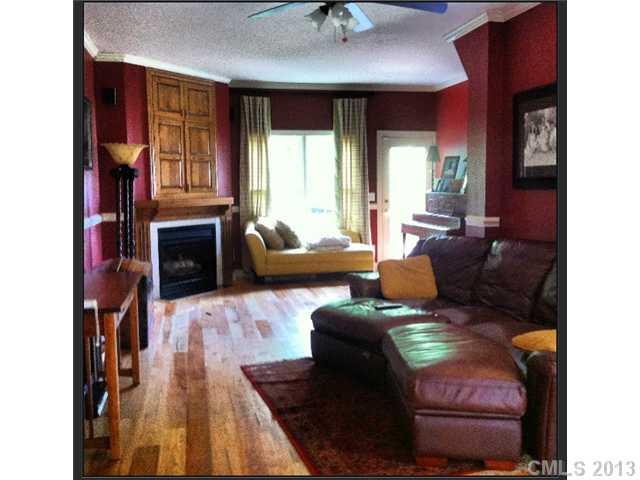 3580 Dobys Bridge Road Fort Mill, SC 29715 - Photo 3 of 15 a living room with furniture fireplace and a large window