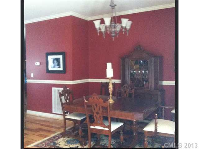 3580 Dobys Bridge Road Fort Mill, SC 29715 - Photo 6 of 15 a view of a dining room with furniture and chandelier