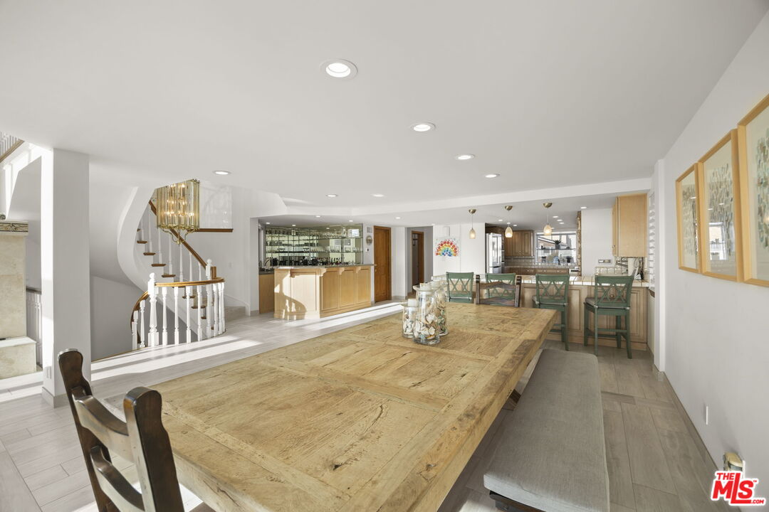 1005 Ocean Drive Oxnard, CA 93035 - Photo 28 of 56 a living room with dining room and wooden floor