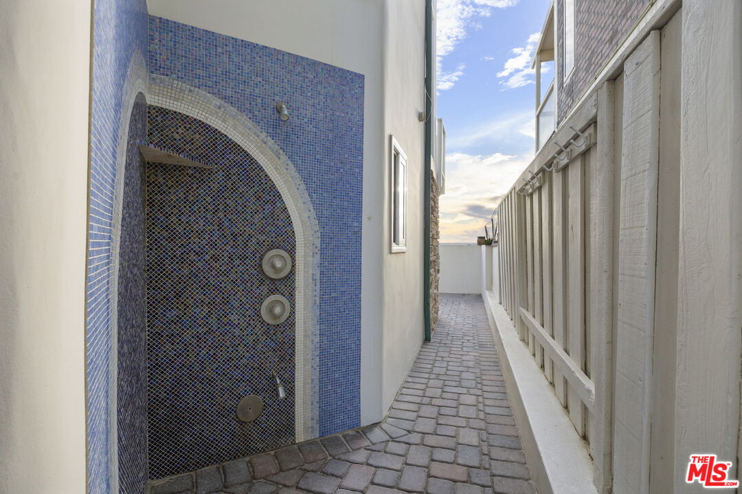 1005 Ocean Drive Oxnard, CA 93035 - Photo 50 of 56 a view of a hallway with wooden door and stairs