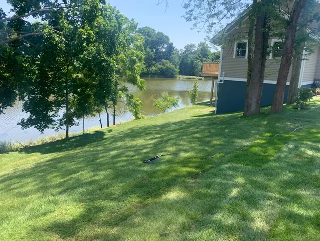 a view of a patio with a yard