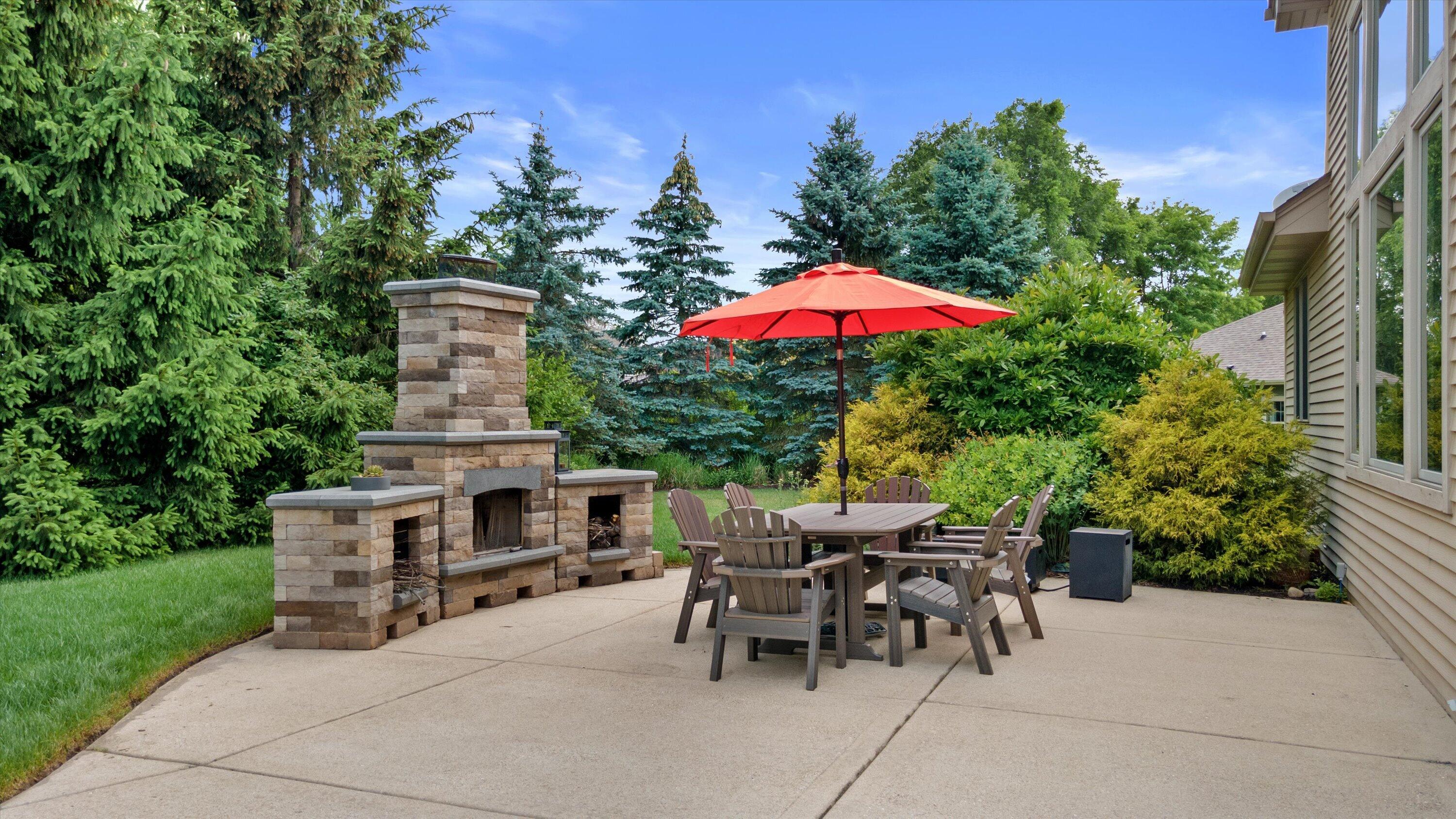 1822 Coach House Court Racine, WI 53406 - Photo 30 of 33 Back Patio with Fireplace