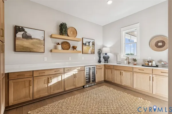 a spacious bathroom with a sink and a mirror