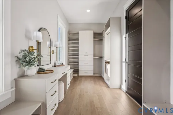 a kitchen with sink and refrigerator